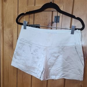 Off white satiny shorts talk talk brand size small front pockets no back pockets